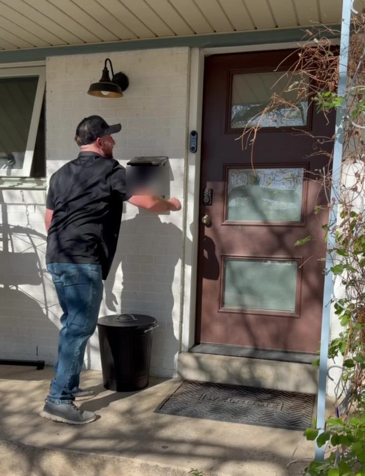 A Goobr container of fresh dog food delivered to a Denver front porch